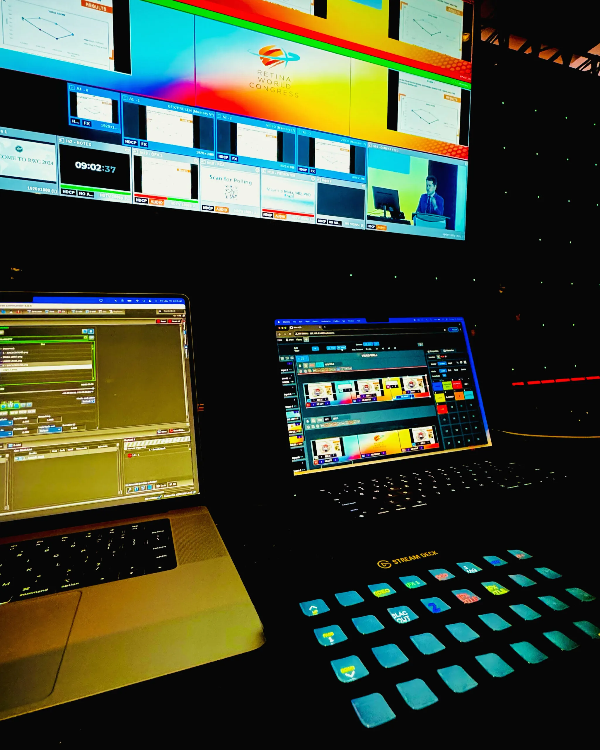 Video control position with laptops, Stream Deck and multiviewer during a live conference